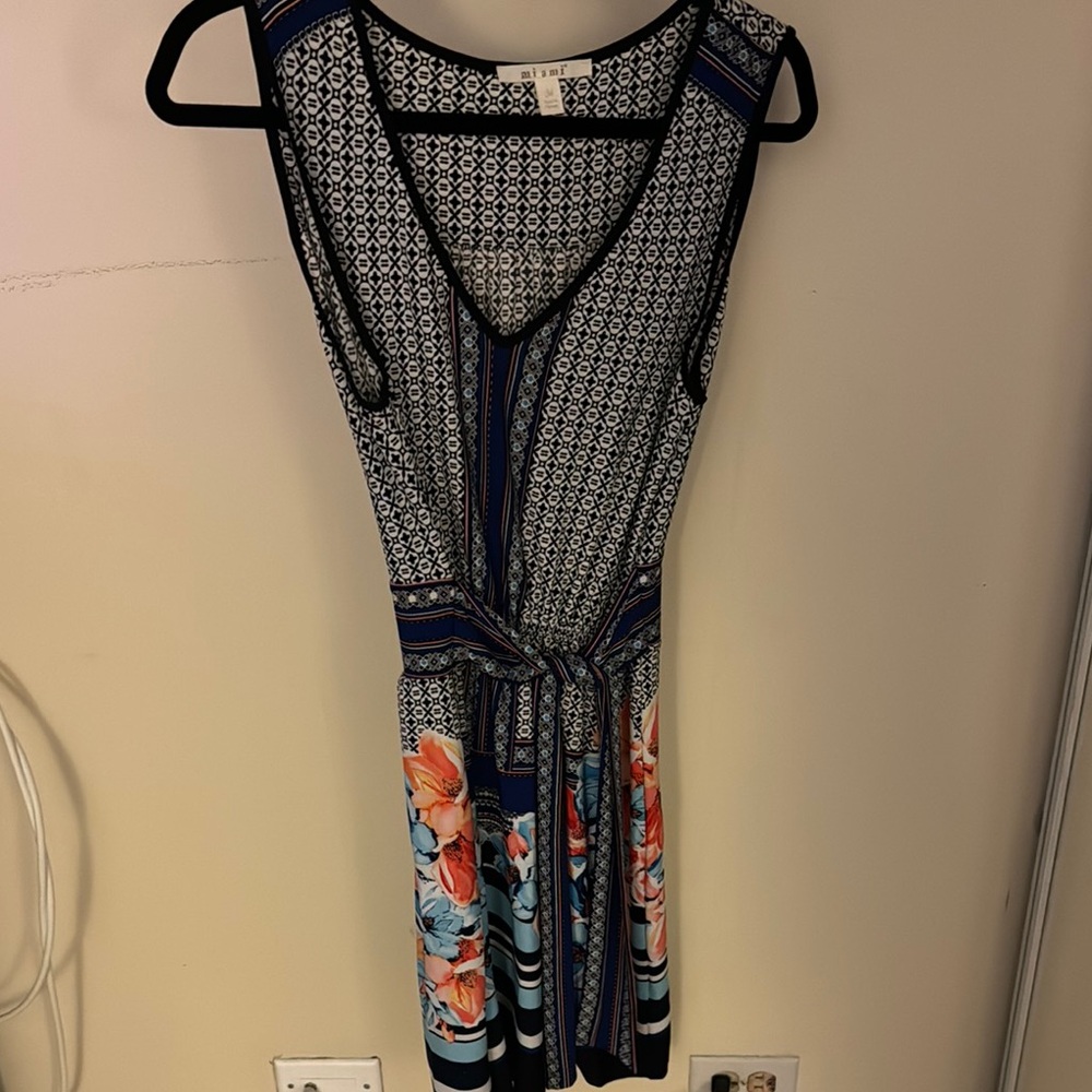 Blue and Black Patterned Dress with Floral Accents